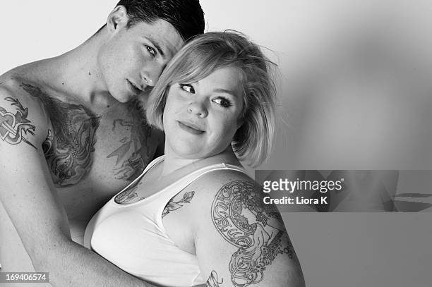 Activist/Blogger Jes M. Baker and model John C. Shay pose for The Militant Baker's "Attractive & Fat" photo shoot at Lovesmack Studios on May 18,...