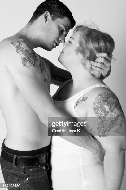 Activist/Blogger Jes M. Baker and model John C. Shay pose for The Militant Baker's "Attractive & Fat" photo shoot at Lovesmack Studios on May 18,...