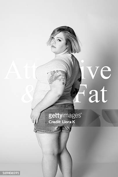 Activist/Blogger Jes M. Baker poses for The Militant Baker's "Attractive & Fat" photo shoot at Lovesmack Studios on May 18, 2013 in Tucson, Arizona.