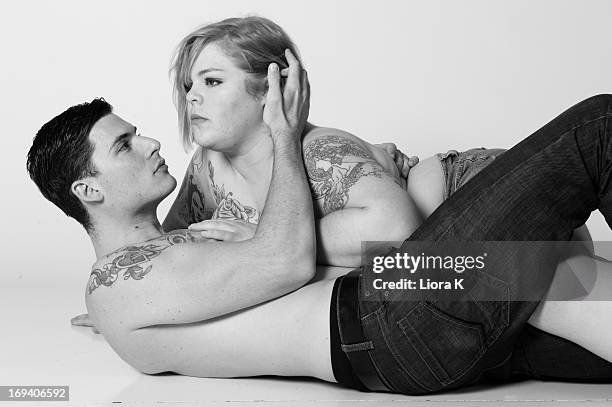 Activist/Blogger Jes M. Baker and model John C. Shay pose for The Militant Baker's "Attractive & Fat" photo shoot at Lovesmack Studios on May 18,...