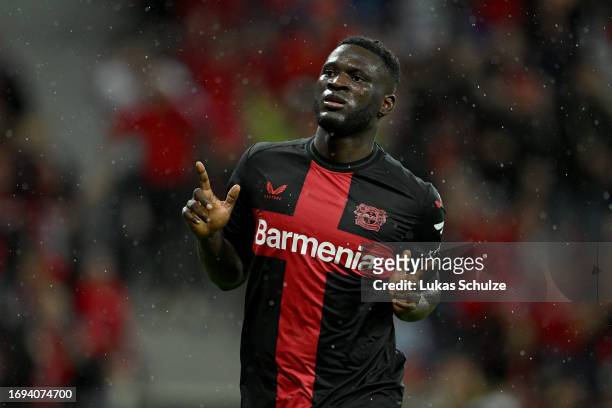 Victor Boniface of Bayer Leverkusen celebrates after scoring the team's third goal during the UEFA Europa League 2023/24 group stage match between...
