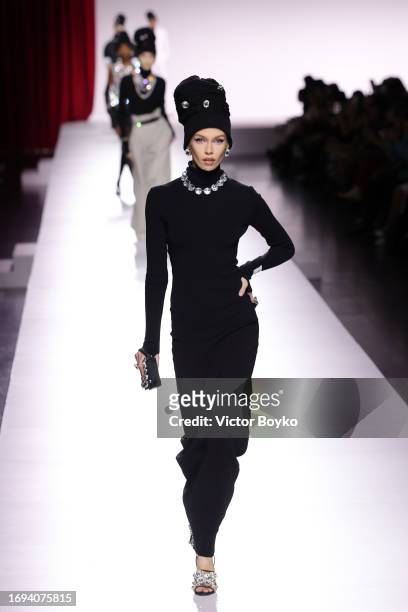 Stella Maxwell walks the runway at the Moschino fashion show during the Milan Fashion Week Womenswear Spring/Summer 2024 on September 21, 2023 in...
