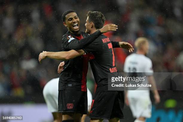 Jonas Hofmann of Bayer Leverkusen celebrates with teammate Amine Adli after scoring the team's fourth goal during the UEFA Europa League 2023/24...