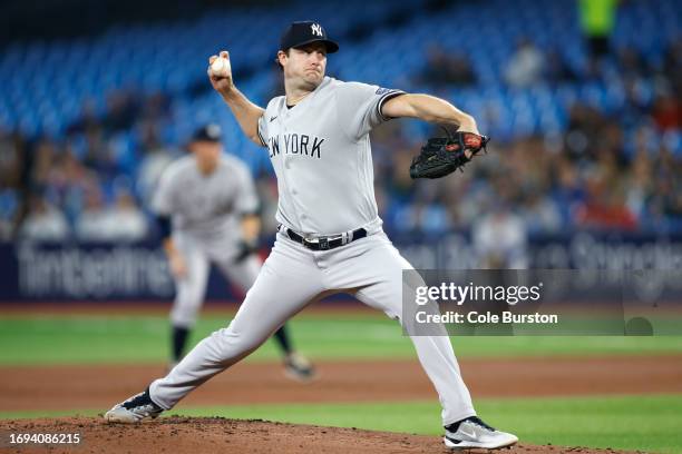 Gerrit Cole of the New York Yankees pitches in the first inning of their MLB game against the Toronto Blue Jays at Rogers Centre on September 27,...