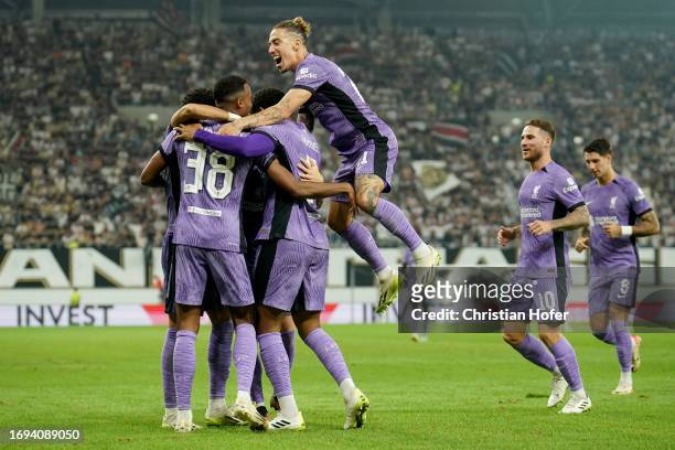 Kostas Tsimikas of Liverpool celebrates with teammates after Luis Diaz scores the team's second goal during the UEFA Europa League 2023/24 group...