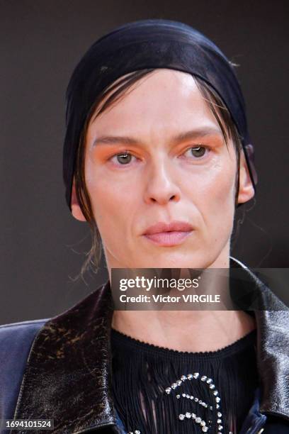 Model walks the runway during the Prada Ready to Wear Spring/Summer 2024 fashion show as part of the Milan Fashion Week on September 21, 2023 in...