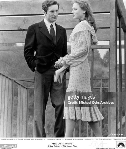 Robert De Niro and Ingrid Boulting standing in house under construction in a scene from the film 'The Last Tycoon', 1976.