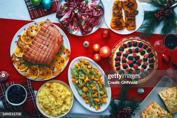 christmas dinner with baked glazed ham with mashed potatoes, green beans, radicchio salad and berry pie - honey ham stock pictures, royalty-free photos & images