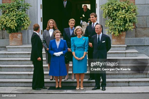 Queen Elizabeth II and Prince Philip on a state visit to Spain seen here with the Spanish Royal Family. L - R; Juan Carlos I, Princess Elena of...