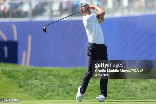 Gareth Bale hits his tee shot on the first hole at the All-Star Match during the Ryder Cup at Marco Simone Golf & Country Club on Wednesday,...