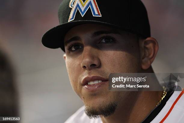 Pitcher Jose Fernandez of the Miami Marlins watches against the Philadelphia Phillies in the first inning at Marlins Park on May 22, 2013 in Miami,...