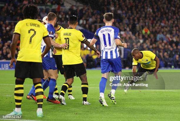 Djibril Sidibe of AEK Athens scores the team's first goal during the UEFA Europa League 2023/24 group stage match between Brighton & Hove Albion and...