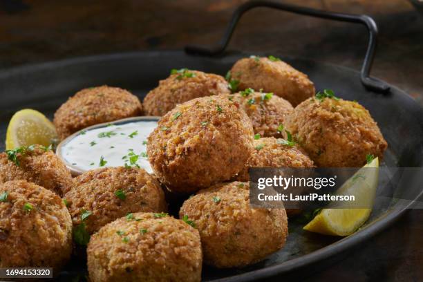 falafel platter with tzatziki sauce - greek food spread stock pictures, royalty-free photos & images
