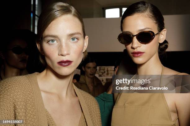 Model Rebecca Longendyke and Catarina Guedes backstage ahead of the Max Mara fashion show during the Milan Fashion Week Womenswear Spring/Summer 2024...