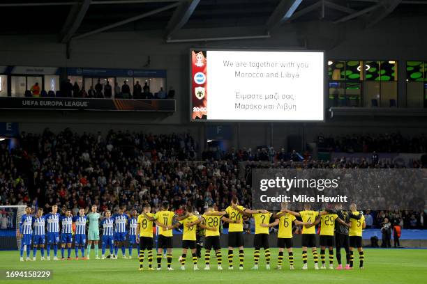 Players, fans and officials hold a minutes silence in memory of the victims of the earthquakes in Morocco and Libya prior to the UEFA Europa League...