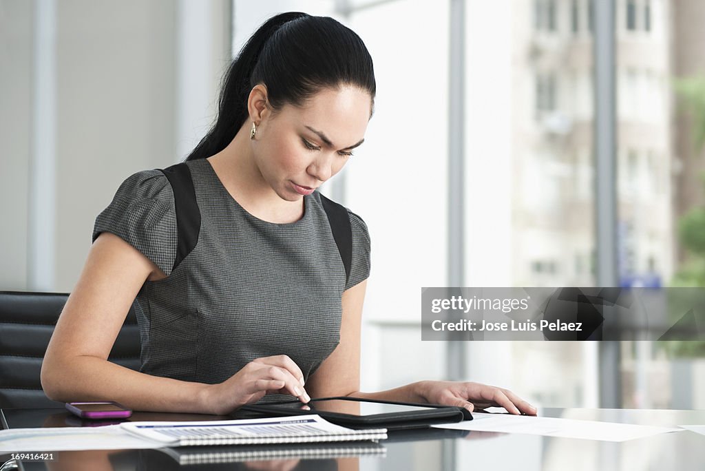 Business woman using a tablet