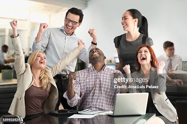 business success - business people cheering in office stockfoto's en -beelden