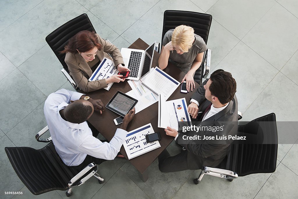 Business people using tablets and phones