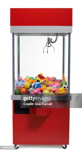 claw machine - crane machines stock pictures, royalty-free photos & images