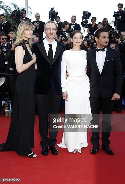 Director James Gray and his wife Alexandra Dickson , French actress Marion Cotillard and US actor Jeremy Renner pose on May 24, 2013 as they arrive...