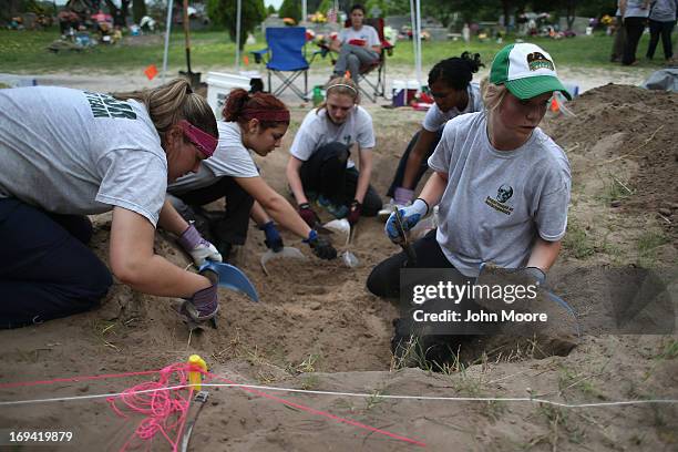 Forensic anthropology team unearths the remains of suspected undocumented immigrants from a gravesite on May 24, 2013 near Falfurrias, Brooks County,...