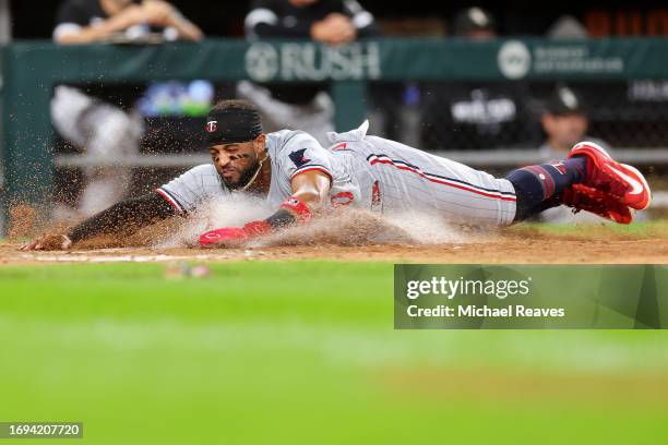 Willi Castro of the Minnesota Twins scores a run during the seventh inning against the Chicago White Sox at Guaranteed Rate Field on September 14,...