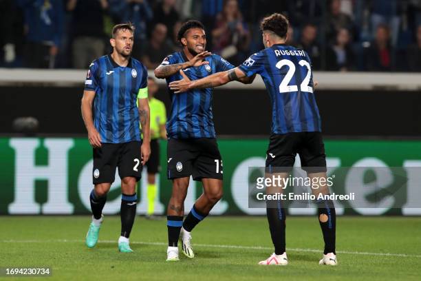 Ederson of Atalanta celebrates with teammate Matteo Ruggeri after scoring the team's second goal during the UEFA Europa League 2023/24 group stage...