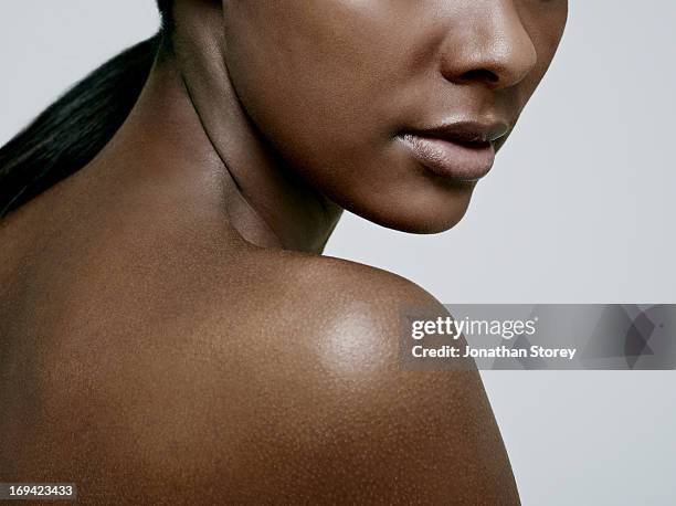 close up of girls chin and nude shoulder - beautiful woman shoulder stock pictures, royalty-free photos & images
