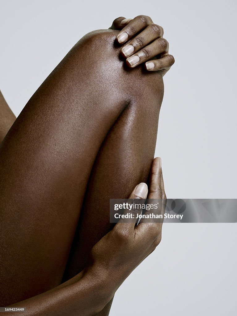 Close up of black females bent knee