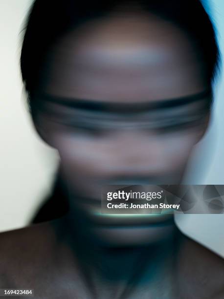 blured image of female shaking head - redactioneel stockfoto's en -beelden