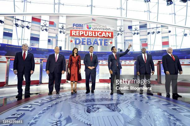 Republican presidential candidates Doug Burgum, from left, Chris Christie, Nikki Haley, Ron DeSantis, Vivek Ramaswamy, Senator Tim Scott and former...