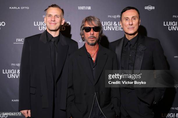 Iango Henzi, Pierpaolo Piccioli and Luigi Murenu attend the photocall for the Luigi & Iango Unveiled Exhibition Opening at Palazzo Reale on September...