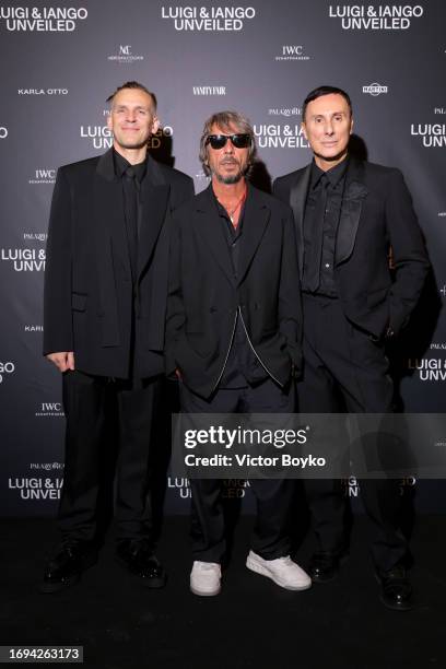 Iango Henzi, Pierpaolo Piccioli and Luigi Murenu attend the photocall for the Luigi & Iango Unveiled Exhibition Opening at Palazzo Reale on September...