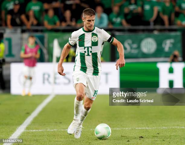 Barnabas Varga of Ferencvarosi TC runs with the ball during the UEFA Europa Conference League 2023/24 Group F match between Ferencvarosi TC and FK...