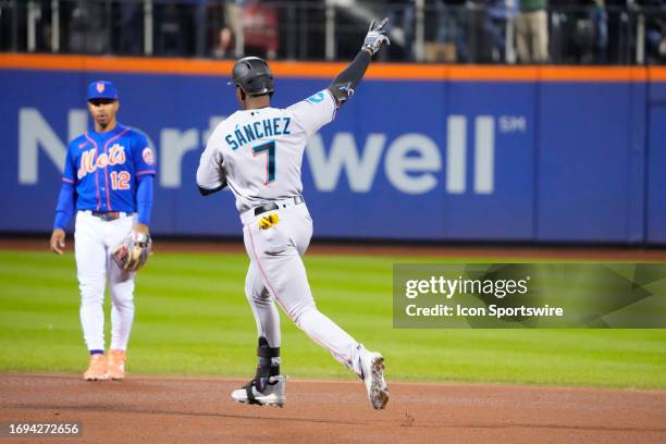 Miami Marlins Right Fielder Jesus Sanchez reacts to hitting a home run as he rounds the bases during the fourth inning of the Major League Baseball...