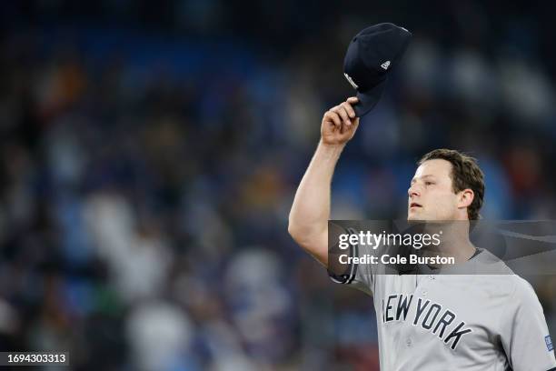 Gerrit Cole of the New York Yankees celebrates pitching a complete game shutout against the Toronto Blue Jays at Rogers Centre on September 27, 2023...