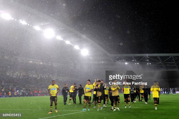 Players of AEK applaud fans following victory during the UEFA Europa League 2023/24 group stage match between Brighton & Hove Albion and AEK Athens...