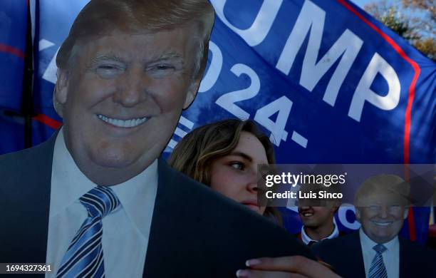 Simi Valley, CA - Supporters of former president Donald J. Trump rally at the intersection of Madera Road and Presidential Drive as GOP presidential...