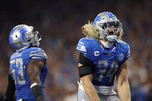 Charles Harris and Alex Anzalone of the Detroit Lions reacts after a play during the fourth quarter in the game against the Seattle Seahawks at Ford...