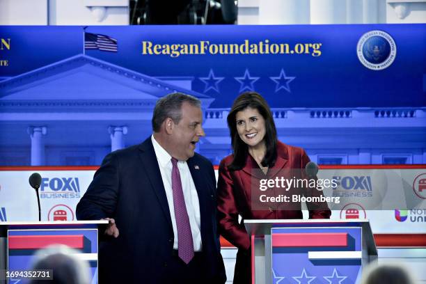 Chris Christie, former governor of New Jersey and 2024 Republican presidential candidate, left, Nikki Haley, former ambassador to the United Nations...