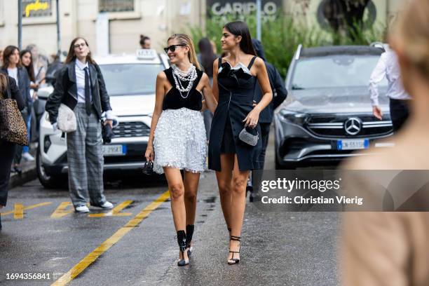 Teresa Andres Gonzalvo wears black white sequined dress, pearl necklace & Teresa Andres Gonzalvo wears black dres outside Emporio Armani during the...