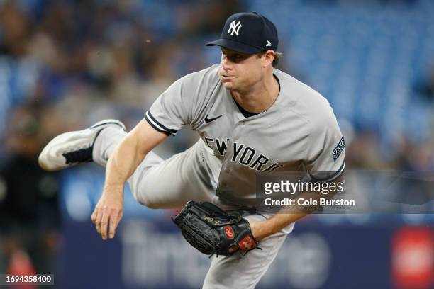 Gerrit Cole of the New York Yankees pitches in the ninth inning of their MLB game against the Toronto Blue Jays at Rogers Centre on September 27,...