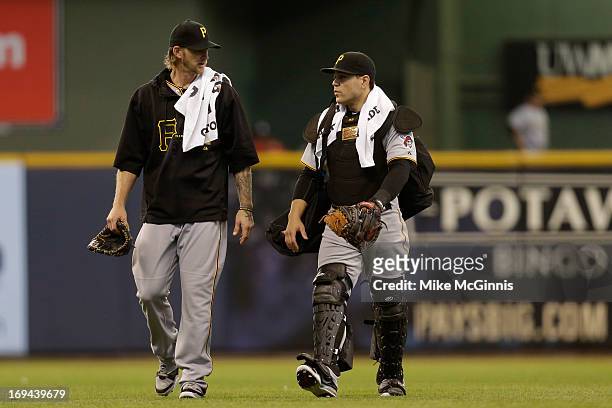 Burnett of the Pittsburgh Pirates talks to catcher Russell Martin before the game against the Milwaukee Brewers at Miller Park on May 24, 2013 in...
