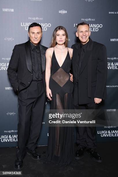 Luigi Murenu, Cambrie Schroder and Iango Henzi attend the Luigi & Iango Unveiled Exhibition Opening at Palazzo Reale on September 21, 2023 in Milan,...