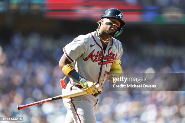 Ronald Acuna Jr. #13 of the Atlanta Braves reacts after flying out during the game between the Atlanta Braves and the Los Angeles Dodgers at Dodger...