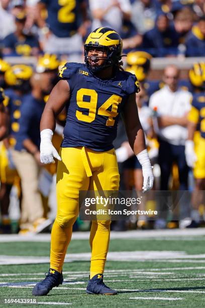 Michigan Wolverines defensive lineman Kris Jenkins looks on during a college football game against the Rutgers Scarlet Knights on September 2023 at...