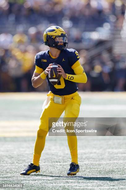 Michigan Wolverines quarterback J.J. McCarthy looks to pass the ball during a college football game against the Rutgers Scarlet Knights on September...