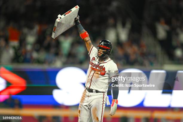 Atlanta right fielder Ronald Acuna Jr. Reacts after stealing his 70th base of the season during the MLB game between the Chicago Cubs and the Atlanta...