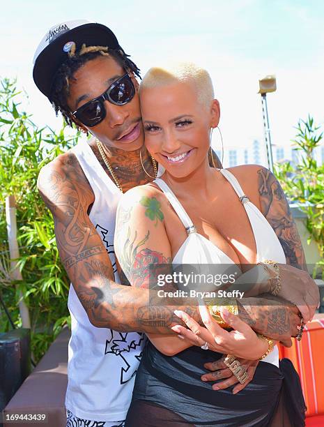 Rapper Wiz Khalifa and model Amber Rose attend Ditch Fridays at the Palms Pool & Bungalows at the Palms Casino Resort on May 24, 2013 in Las Vegas,...