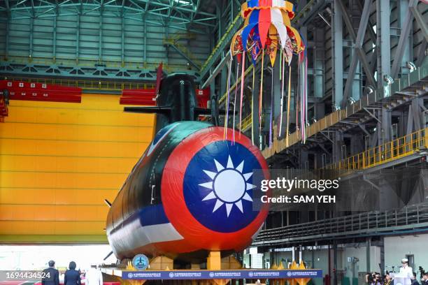 Taiwan's first locally built submarine "Narwhal" is seen during unveiling ceremony at the CSBC Corporation shipbuilding company in Kaohsiung on...